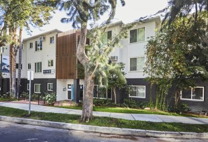 Apartments in West Hollywood; Raised garden beds next to the entrance of the Dean on De Longpre building