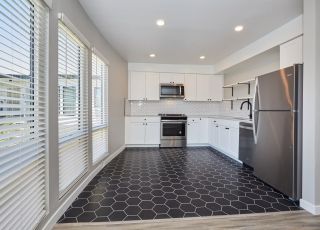 Kitchen layout at Aiden on Ash apartment building