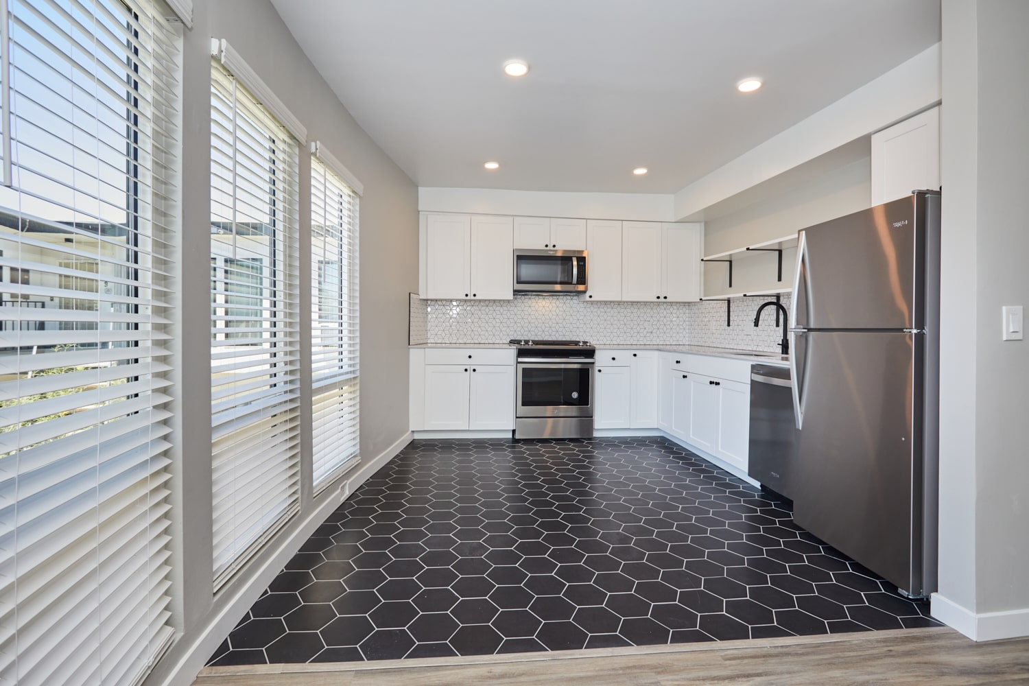 Kitchen layout at Aiden on Ash apartment building