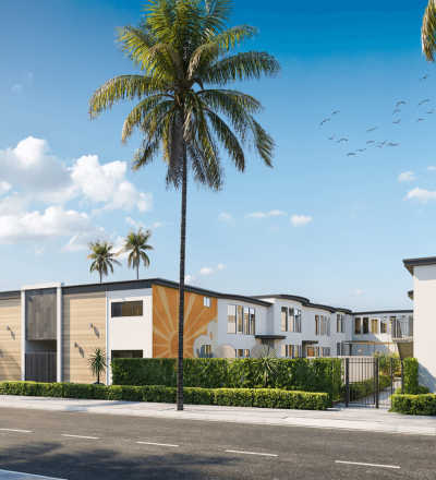 Aiden on Ash exterior on a palm tree-lined street