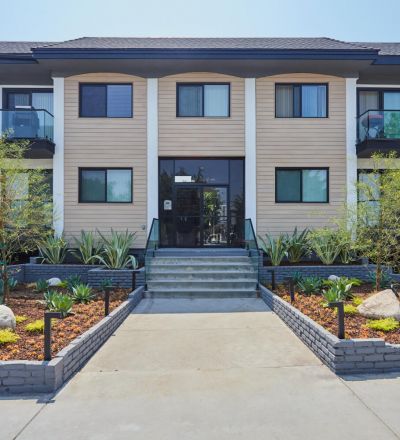 West LA Apartments; Beau on Bundy exterior in the amidst of two cactus gardens