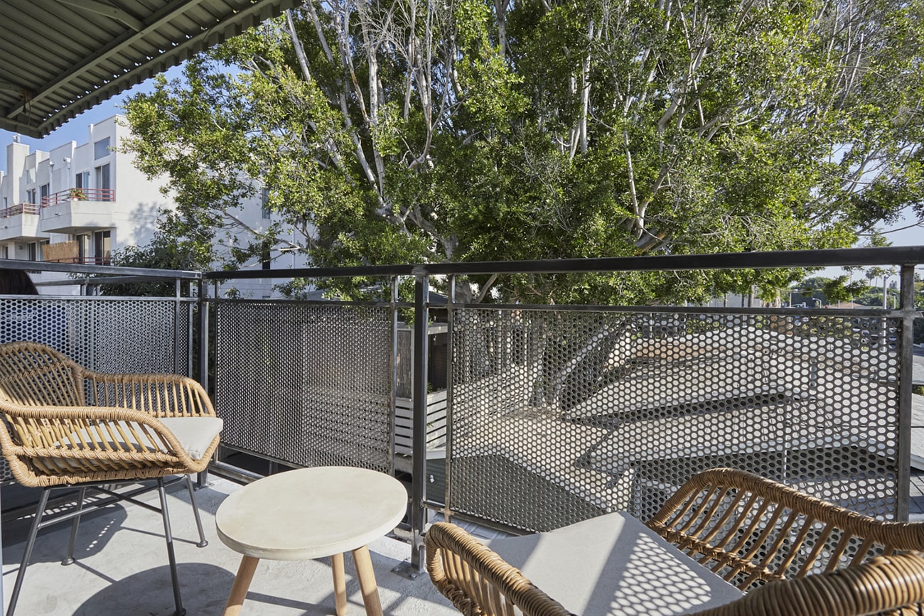 Apartment balcony decorated with patio furnitures