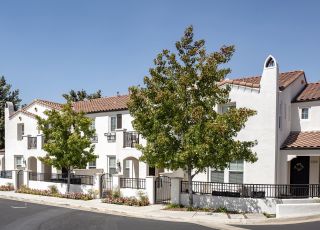 Rancho Serrano exterior with a fenced yard; Thousand Oaks rental real estate;