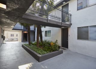Apartment with pathway balconies connecting to the other side of the building