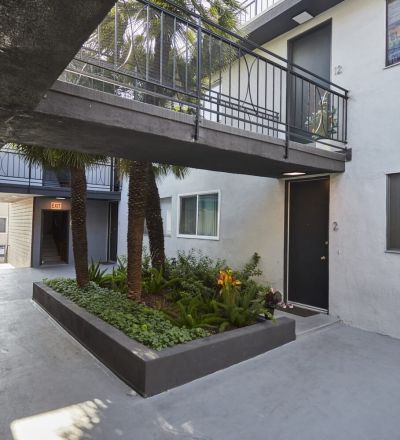 Apartment with pathway balconies connecting to the other side of the building