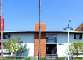 Clover on Carlton exterior with metal fenced yard