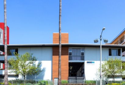 Clover on Carlton exterior with metal fenced yard