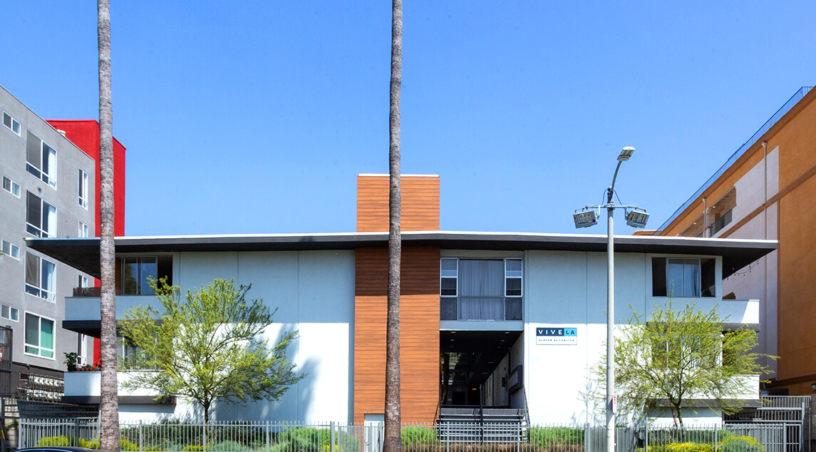 Clover on Carlton exterior with metal fenced yard
