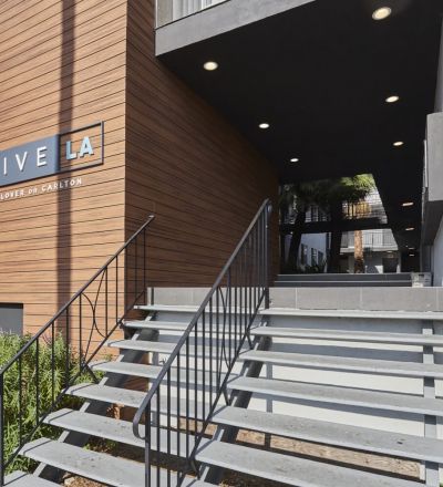 Stairs leading to the entrance of the Clover on Carlton building