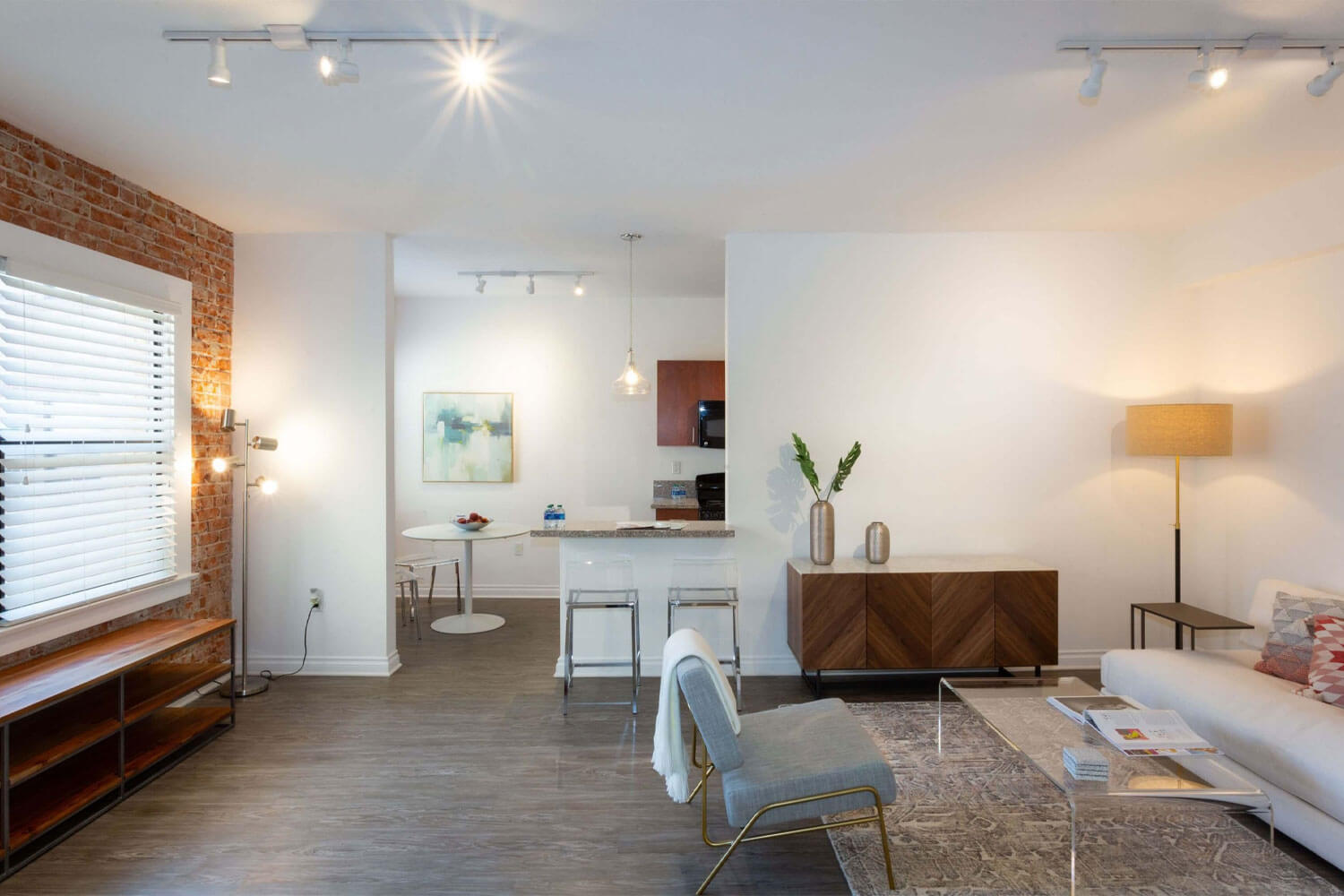 Living room area next to the kitchen and dining space at The Gershwin Apartment; Luxury Hollywood Rentals; boutique community apartments in Hollywood