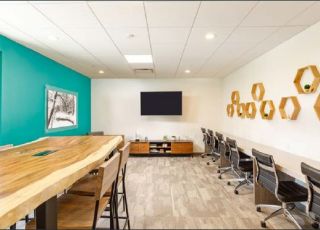 Communal business area at Violet on Virgil apartment building