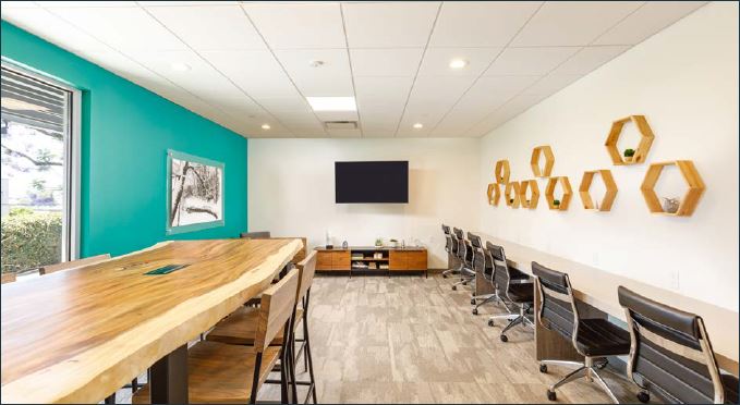 Communal business area at Violet on Virgil apartment building