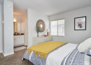Violet on Virgil Apartments bedroom overlooking the powder room next to the bathroom