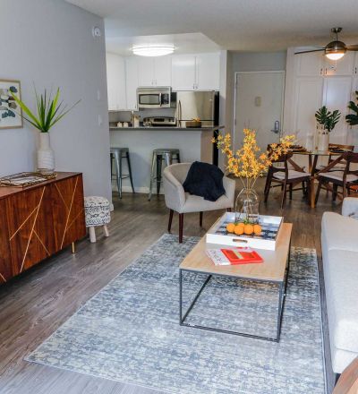 Living room next to the kitchen and dining area at Violet on Virgil