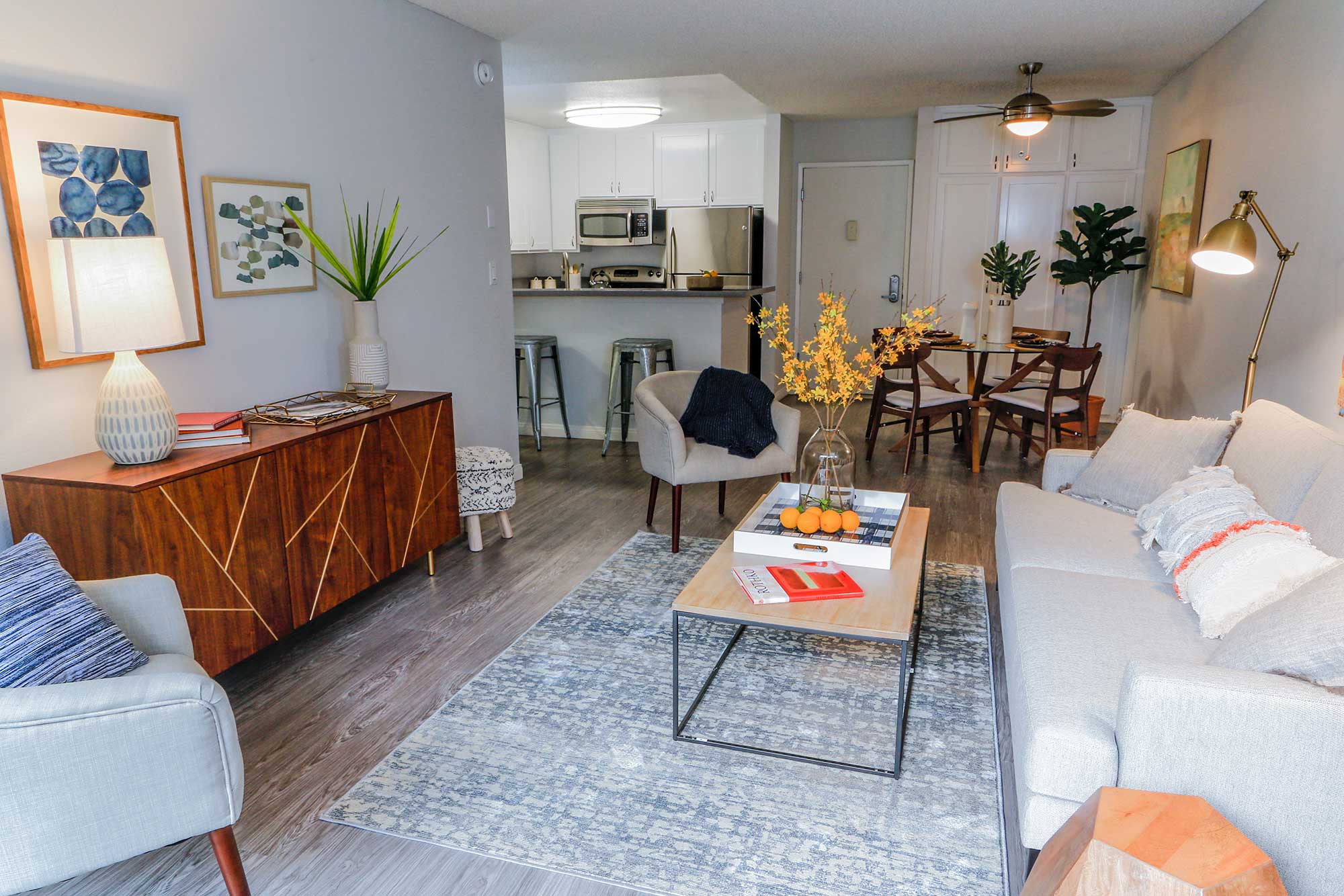 Living room next to the kitchen and dining area at Violet on Virgil