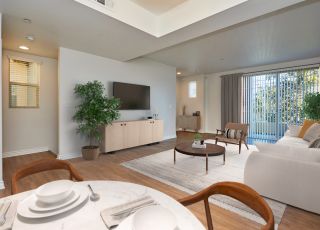 Dining space next to the living room at townhomes at Magnolia Woods