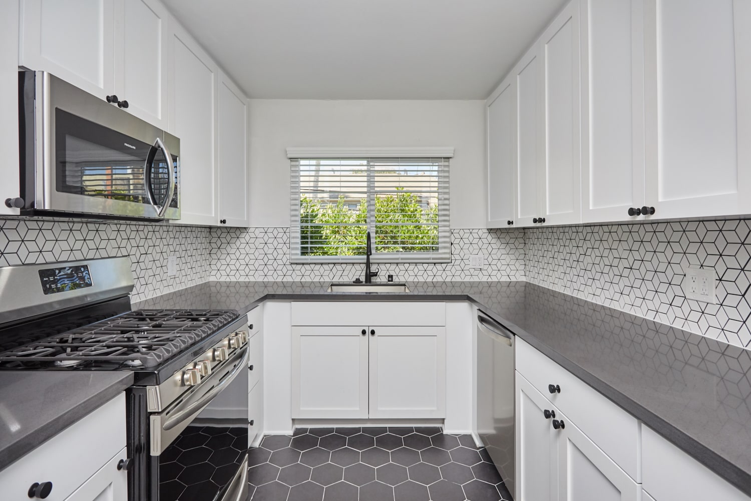 Rental LA apartment kitchen view, furnished with window; Hayden on Hollywood Boulevard