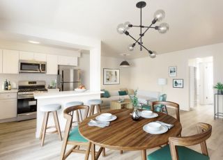 View of living room, dining room, and kitchen