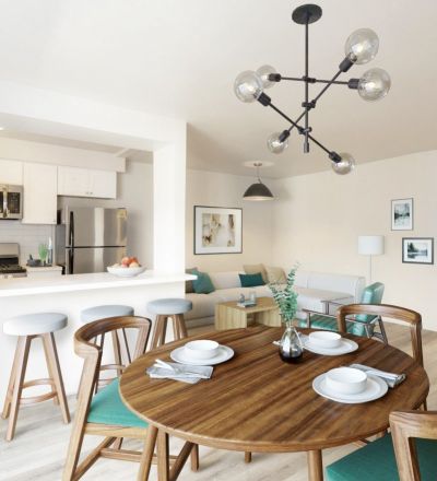 View of living room, dining room, and kitchen