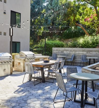 Barbeque and eating area; Milo on Morton building exterior