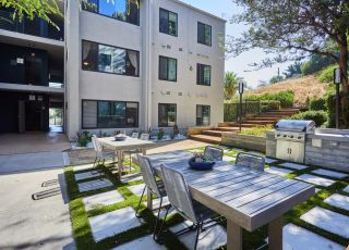 Outdoor eating area; Milo on Morton building exterior