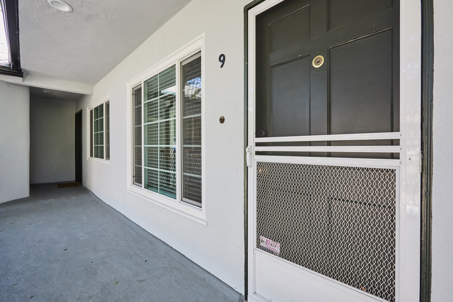 Front door to apartment 9