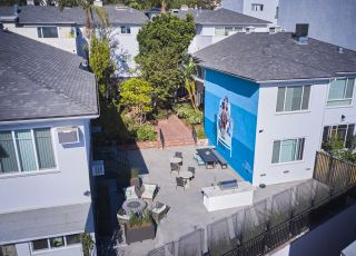Aerial of sitting area with art on wall