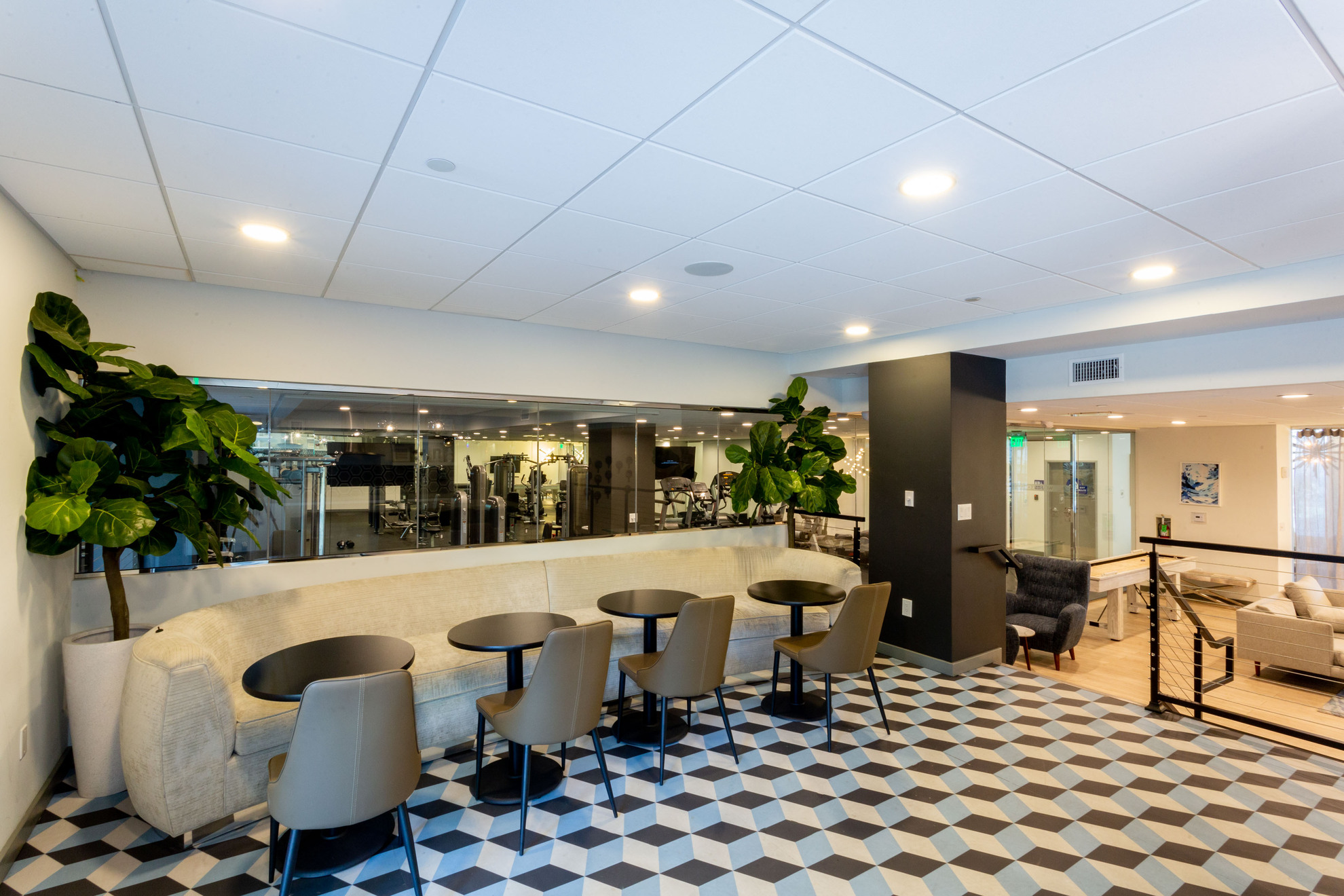 Next Apartments Los Angeles; The Violet Apartments In LA; An image of a building's lobby with a checkered floor, providing a stylish and sophisticated atmosphere.